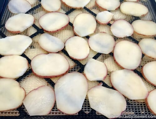 blanched potatoes on tray