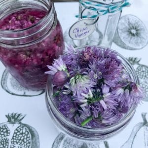 chive flowers stuffed in jar