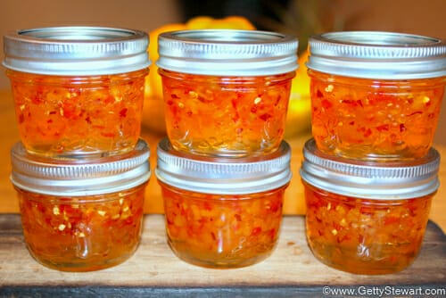 6 stacked hot pepper jelly jars