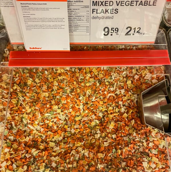 vegetable flakes in bulk bin at store