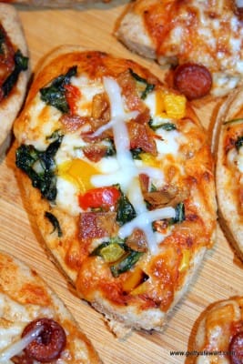 Spinach and Bacon Football Pizzas