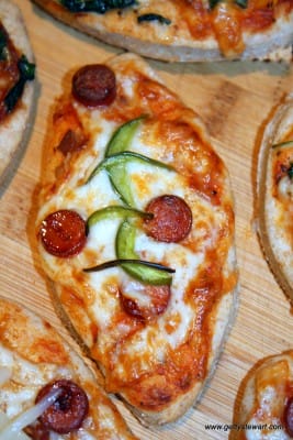 Pepperoni and Green Pepper Football Pizzas