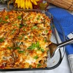 pan of macaroni chicken and spinach bake with lifter sticking out