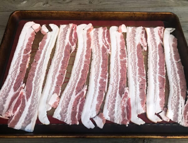 raw bacon on tray no foil
