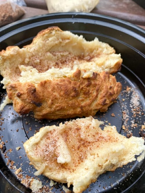 bannock with melted butter and cinnamon sugar on plate