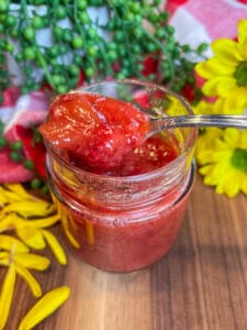 strawberry rhubarb freezer jam on spoon