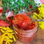 strawberry rhubarb freezer jam on spoon