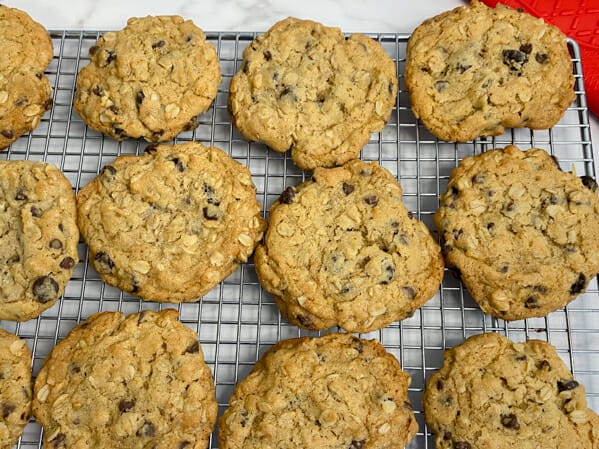 chocolate chip oat cookies on rack