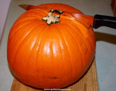 cutting the pumpkin