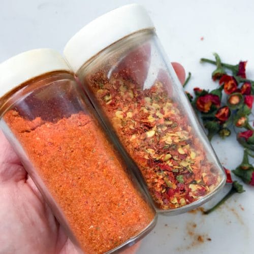 jars of homemade cayenne pepper and pepper flakes