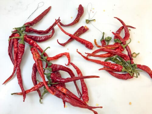 cayenne peppers dried on a string
