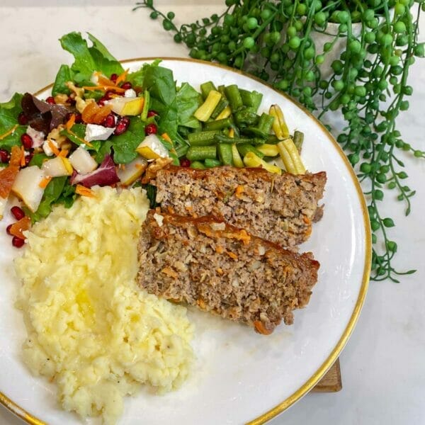 meatloaf on plate with potatoes