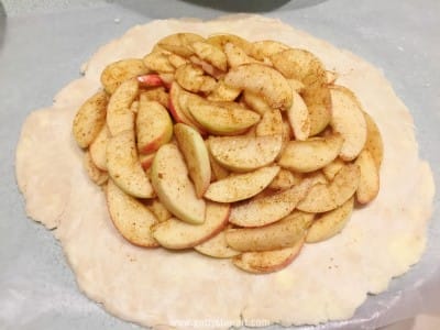 pile apples on dough - watermarked