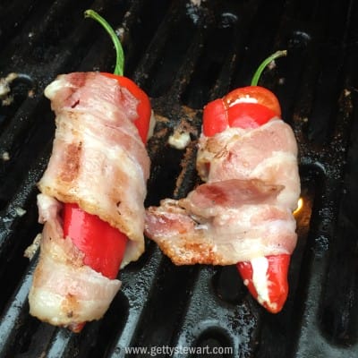 grilling away bacon wrapped peppers