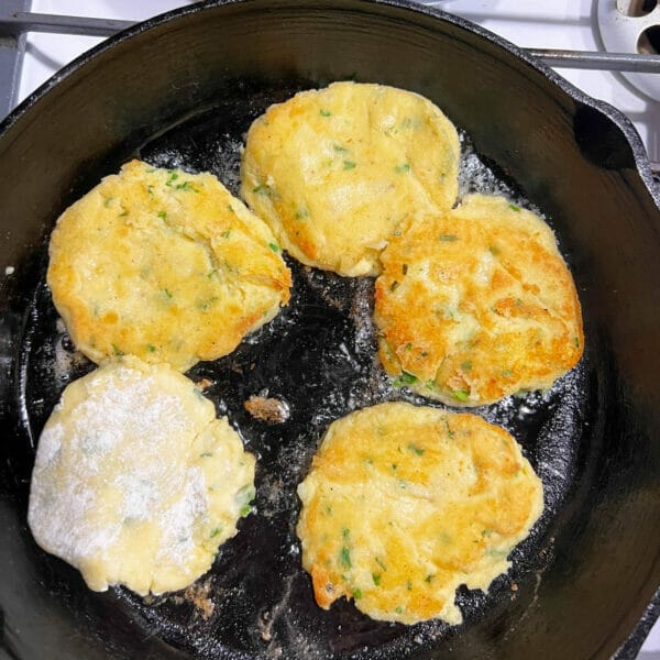 potato patties in cast iron fry pan
