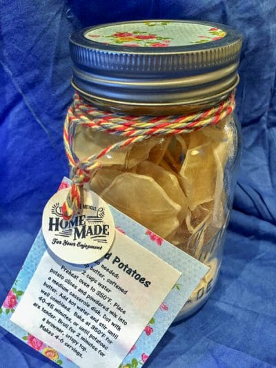 scalloped potatoes in jar with label