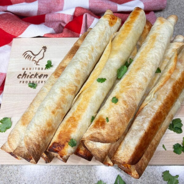 rolled baked taquitos on board