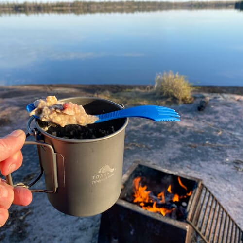 oatmeal by fire and lake