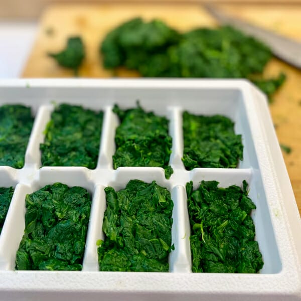 spinach in ice cube tray