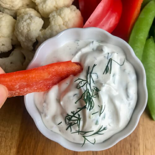 creamy herb dip garnished with fresh dill