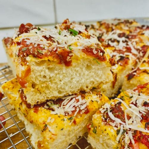 piece of focaccia made with frozen tomatoes