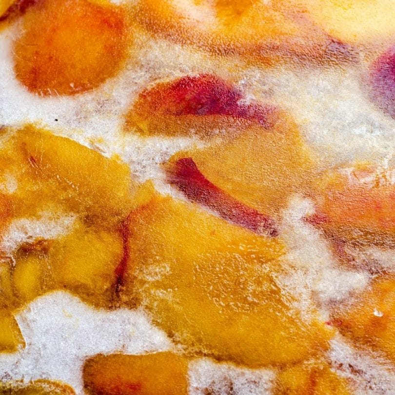 ice crystals on frozen peaches