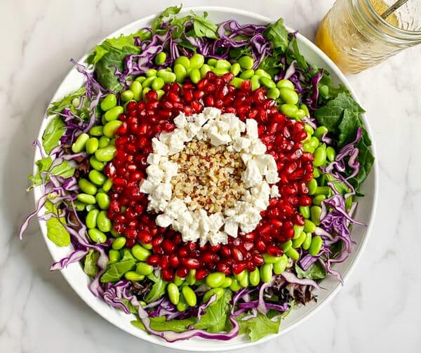 pomegranate whole grain salad in bowl