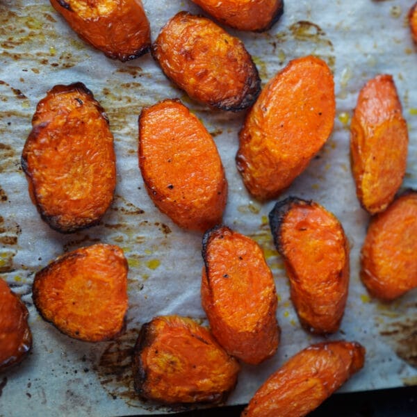 roasted carrots diagonal cut on baking sheet