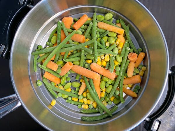 mixed frozen veggies in steam basket