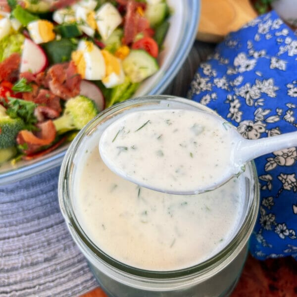 buttermilk ranch dressing in jar and spoon