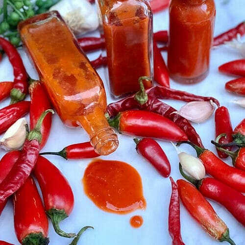 hot pepper sauce and peppers