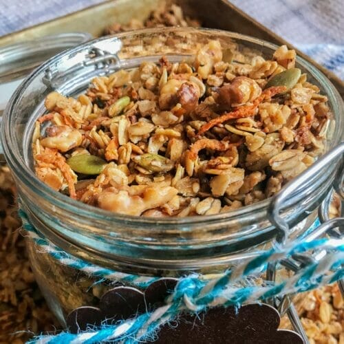 top of jar filled with carrot granola
