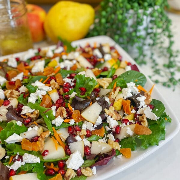 pear and pomegranate salad on plate