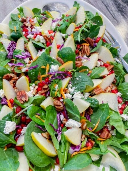 pear and pomegranate salad on platter