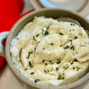 mashed potatoes with chives in a bowl