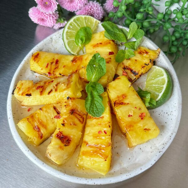 honey lime pineapple on plate with hot pepper flakes