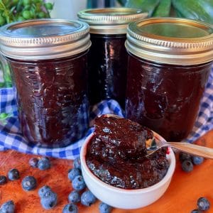 blueberry jam jars and on spoon