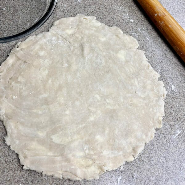 rolling pie pastry into circle