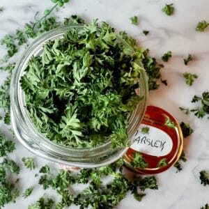 top of overflowing jar with dried parsley