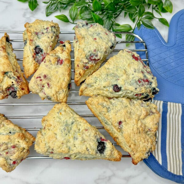 blueberry raspberry scones on cooling rack - vegan version that look identical to regular version
