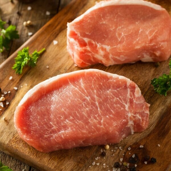center cut boneless pork chops on cutting board