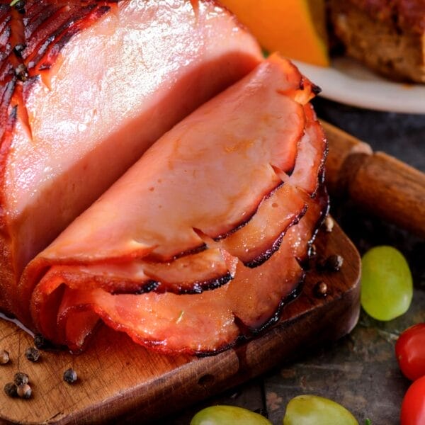 partially sliced ham on board
