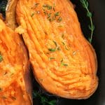 butter melted onto baked sweet potato with herbs