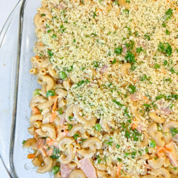 ham and peas mac and cheese in dish before baking
