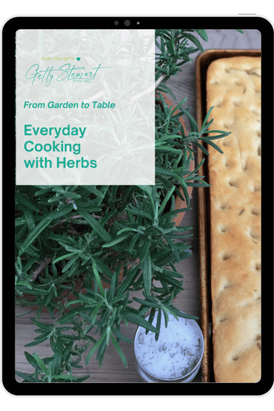 cover of herb book with text, rosemary plant and baked focaccia