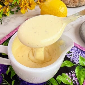 hollandaise sauce in dish with spoon