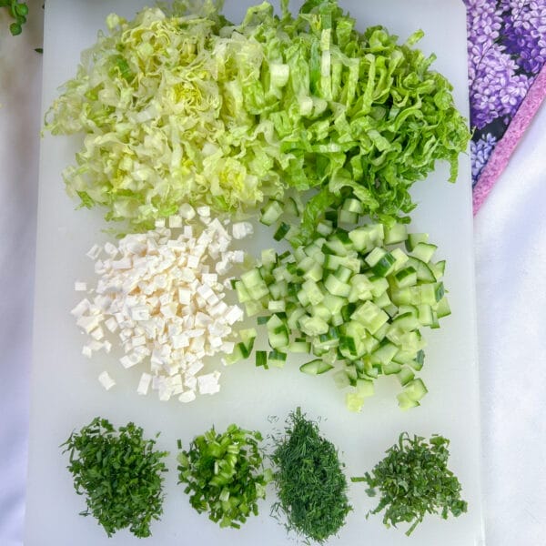 simple green ingredients on white cutting board